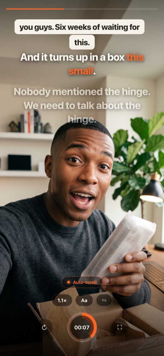 Filming an unboxing at home, holding the product up to the camera